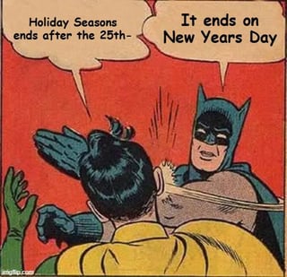 A comic-style meme panel featuring two characters in a debate about when the holiday season ends. The first character (likely Robin, in a yellow costume) states, 'Holiday Seasons ends after the 25th—' while raising a hand. The second character, Batman (in a blue and gray costume with a mask), responds assertively, 'It ends on New Years Day,' and is shown striking the first character with a gloved hand. The art style is retro comic book, with bold colors (red background, yellow and blue costumes) and dynamic action lines emphasizing the strike. The meme humorously depicts a common seasonal debate through a classic superhero comic scenario.