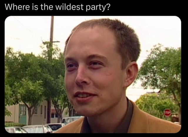 A meme image consisting of a screenshot of a real man standing outdoors. The background features trees, parked cars, a stop sign, and residential buildings. The man has short hair, wears a brown jacket, and looks to his side with a neutral, slightly curious expression. At the top of the image, there is a prominent overlaid text reading 'Where is the wildest party?', which appears to be the central question of the meme.
