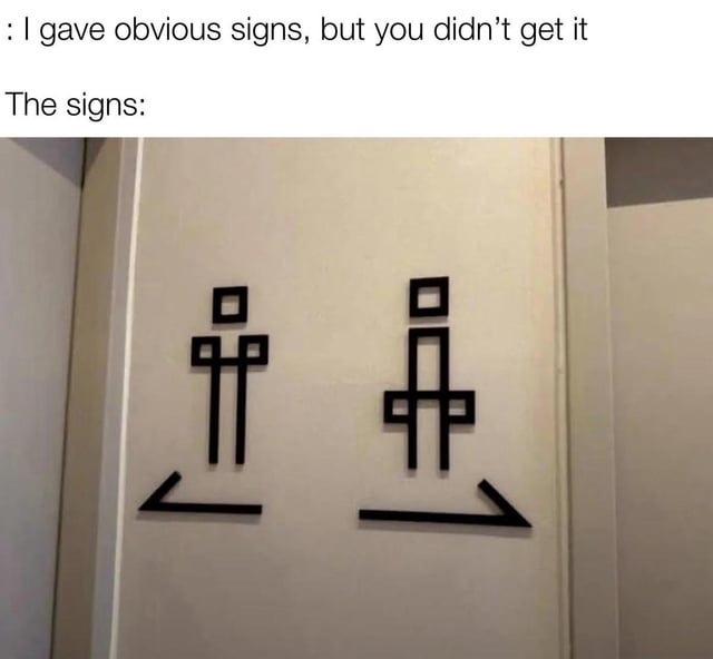 A meme consisting of two parts: top text reading 'I gave obvious signs, but you didn't get it' followed by 'The signs:' and an image of two abstract black line symbols on a white wall. Each symbol resembles a stick figure with square components, accompanied by left-pointing (left symbol) and right-pointing (right symbol) arrows. The humor stems from the irony that the 'obvious signs' are actually vague, unrecognizable abstract shapes, making the recipient's confusion justified.