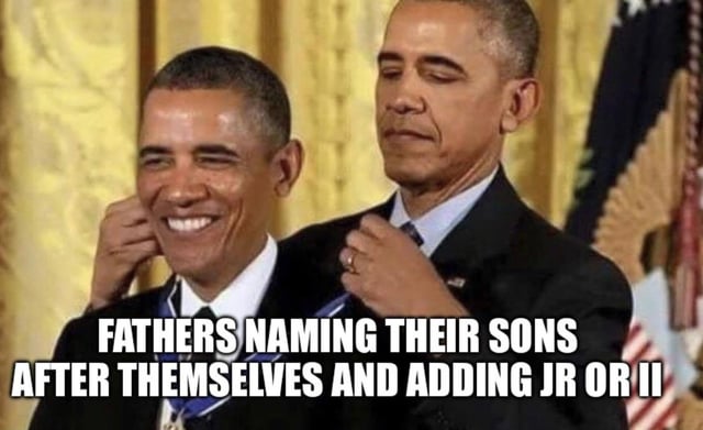 This meme uses an edited photograph featuring two identical versions of former U.S. President Barack Obama. One version of Obama stands behind the other, placing a medal around the neck of the second Obama, who is grinning widely. Text overlaid at the bottom of the image reads 'FATHERS NAMING THEIR SONS AFTER THEMSELVES AND ADDING JR OR II'. The joke draws a humorous parallel between the common practice of fathers naming their sons after themselves with a generational suffix, and the visual of Obama effectively giving an award and his own identity to a copy of himself.