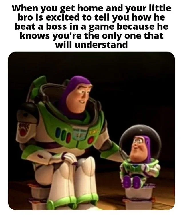 This is a wholesome relatable meme that uses a scene from *Toy Story* to illustrate a sweet sibling moment. The top text describes the situation: when you arrive home, your little brother is excited to tell you he just beat a difficult boss in a video game, because he knows you are the only person who will truly understand how big of an achievement this is. The image visualizes this dynamic: a larger Buzz Lightyear (representing the older brother) kneels and smiles warmly while listening to a smaller excited Buzz Lightyear (representing the little brother) sharing his win.