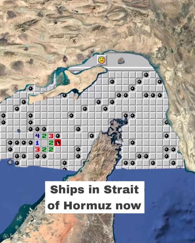 This meme satirizes the high-stakes geopolitical situation in the Strait of Hormuz by reimagining the region as a game of Microsoft Minesweeper. A satellite map of the strait is overlaid with the classic Minesweeper grid: black star icons represent dangerous 'mines' (symbolizing real-world maritime risks like naval threats or explosive mines), numbered tiles indicate adjacent hazards, and a red flagged tile represents a ship navigating the area. A sad face emoji at the top emphasizes the tense, risky nature of the scenario, while the bottom caption reads 'Ships in Strait of Hormuz now' to ground the joke in real-world events. The meme uses the familiar, casual gaming format to comment on serious geopolitical tensions in a humorous, accessible way.