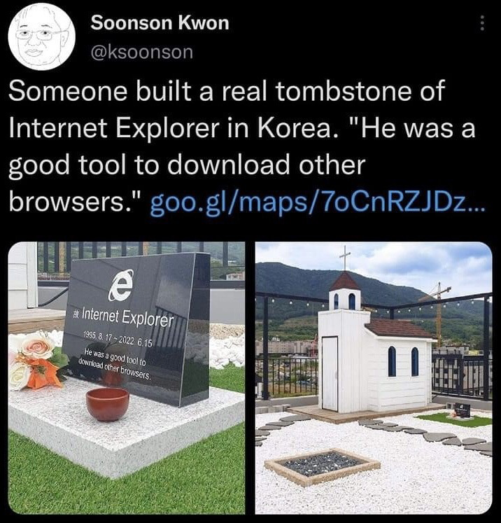 This image is a screenshot of an X (formerly Twitter) post showing a real commemorative tombstone for the discontinued Internet Explorer web browser installed in South Korea. The left panel is a close-up of the dark granite tombstone, marked with the Internet Explorer 'e' logo, its operational dates from August 17, 1995 to June 15, 2022, the Korean character for 'deceased' before its name, and the humorous epitaph "He was a good tool to download other browsers", with artificial flowers and a small red offering bowl placed at its base. The right panel shows the full location of the tombstone, a small rooftop display area with a miniature white church, gravel paths, artificial grass, and mountain and city scenery in the background. The humor comes from the widely circulated internet joke that the notoriously slow and outdated Internet Explorer was primarily used by new computer users only to download more functional competing browsers like Google Chrome or Firefox.