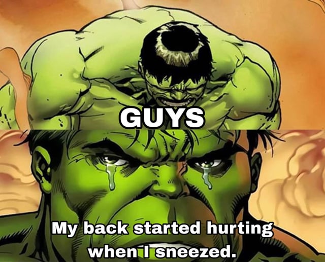 A two-panel meme featuring the Hulk from Marvel Comics. The top panel shows a mid-shot of the Hulk with a strained expression, accompanied by the text 'GUYS' in bold white letters. The bottom panel is a close-up of the Hulk's face, with tears streaming down his cheeks, and the text 'My back started hurting when I sneezed.' The humor stems from the contrast between the Hulk's superhuman strength and his relatable complaint of back pain from a mundane action like sneezing, creating a funny and relatable scenario.