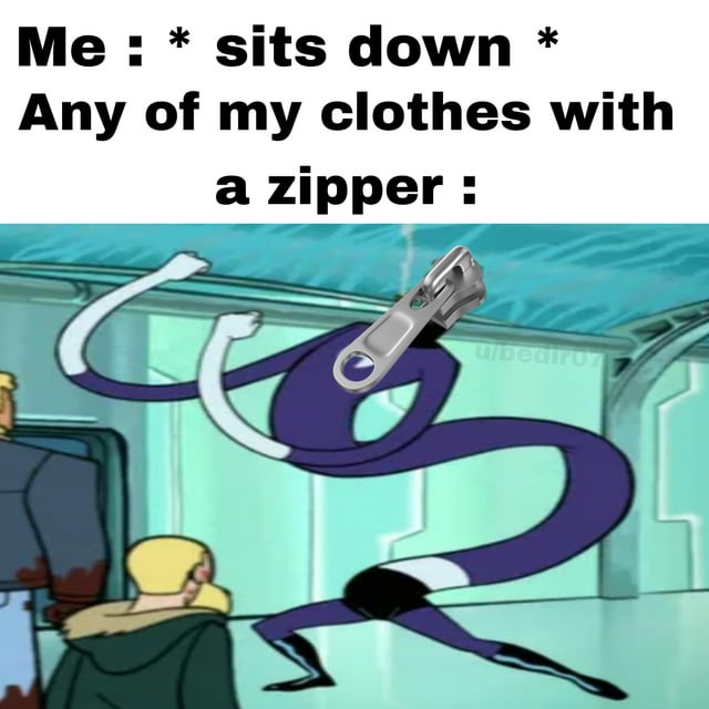 A meme consisting of top text and an edited animated screenshot. The top text reads: 'Me : * sits down * Any of my clothes with a zipper :'. Below is an edited scene from the animated show 'Danny Phantom,' featuring a purple ghost-like character with its head replaced by a metal zipper pull. The character is in a dynamic, aggressive pose with arms raised, humorously representing the frustration of zippers on clothing misbehaving when sitting down.