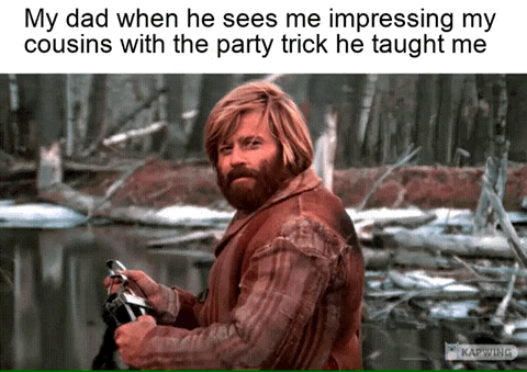 This is a relatable humorous meme. At the top of the image, there is a text caption that reads "My dad when he sees me impressing my cousins with the party trick he taught me". Below the caption is a still frame of Leonardo DiCaprio playing the character Hugh Glass from the 2015 film *The Revenant*, set against a snowy winter forest background. The character is looking over his shoulder with a quiet, smug, proud expression while holding a small object in his hands. The joke lies in how the character's satisfied, proud expression perfectly captures the subtle, unspoken pride a father feels when he sees his child successfully use a skill he taught them to impress other family members.