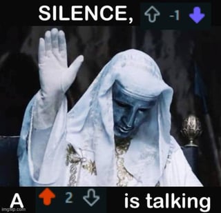 The meme features a central character dressed in a white religious robe with gold embroidery, raising their right hand in a silencing gesture. At the top of the image, there is text reading 'SILENCE, ↑ -1 ↓' with a purple downvote arrow. At the bottom, text reads 'A ↑ 2 ↓ is talking' with a blue upvote arrow. The upvote and downvote arrows reference Reddit's voting system, where '↑ 2 ↓' implies the user 'A' has 2 upvotes and some downvotes, while the top text mocks someone with a -1 score trying to silence others.