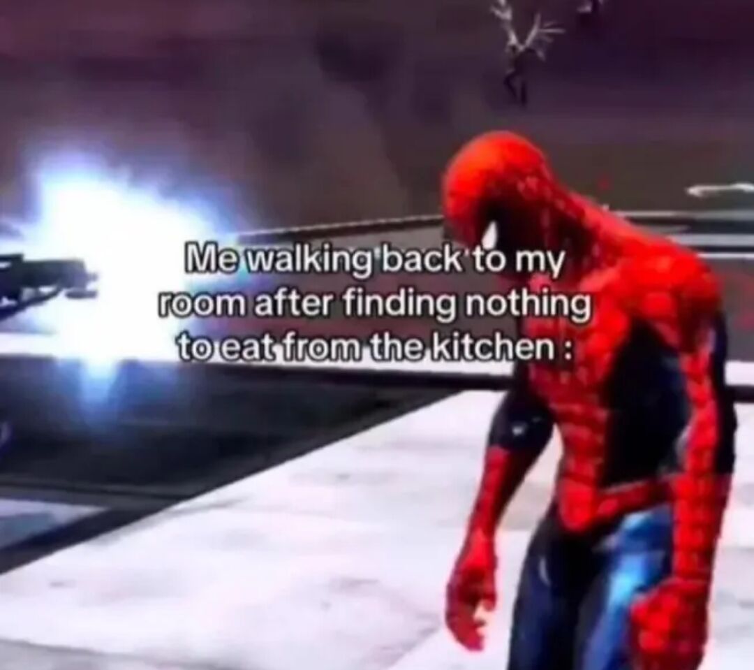 This is a relatable meme that uses game footage of Spider-Man. Spider-Man is shown walking slowly forward with his head hung low, conveying clear dejection and disappointment. The overlaid text reads "Me walking back to my room after finding nothing to eat from the kitchen :", connecting Spider-Man's sad posture to the common everyday experience of going to the kitchen looking for food or a snack, finding nothing available, and sadly returning to your room disappointed. The meme highlights how this small minor letdown feels genuinely disappointing in the moment, making it relatable for many people.