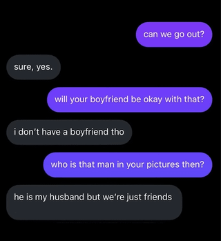 This image is a screenshot of a two-person text message conversation against a black background. The sender with purple text bubbles first asks the recipient if they can go out, which the recipient in dark gray bubbles agrees to. The sender then asks if the recipient's boyfriend will be okay with the plan, and the recipient replies that they do not have a boyfriend. Next, the sender questions who the man present in the recipient's posted pictures is, leading to the absurd punchline response from the recipient: "he is my husband but we're just friends". The humor derives from the obvious contradiction of being legally married to someone while claiming they are only a friend, implying the recipient is either looking to cheat on their spouse, or is in an extremely unusual, casual marriage dynamic.