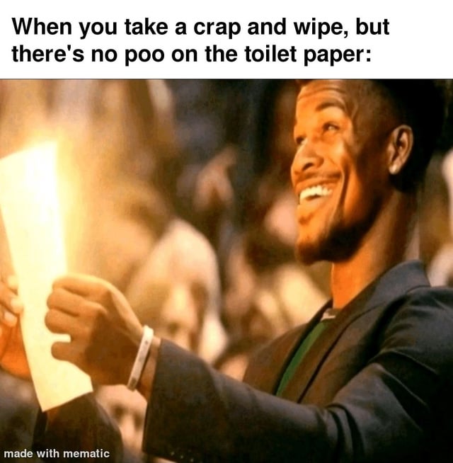 This meme centers on a relatable, small everyday win: the satisfying feeling of wiping after using the toilet and finding the toilet paper completely clean. It uses an edited photograph of NBA player Jimmy Butler, where the paper he is holding is digitally altered to glow brightly. Butler has an ecstatic, joyful expression, looking upwards while holding the paper, which amplifies the 'divine' positive feeling of this mundane but surprisingly gratifying moment. The top text caption sets up the scenario, making the meme highly relatable to anyone who has experienced this small pleasure.