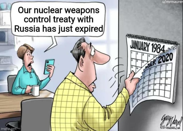 An illustration depicting two animated characters in an office. A woman (blue shirt) sits at a desk, holding a smartphone and coffee cup, with a shocked expression, saying: 'Our nuclear weapons control treaty with Russia has just expired.' A man (yellow checkered shirt) stands, tearing a wall calendar to reveal 'SEPTEMBER 2020' beneath 'JANUARY 1984,' symbolizing the treaty's long duration. The comic satirizes the expiration of a long-standing nuclear arms control agreement between the U.S. and Russia, likely referencing the SALT/START treaties.