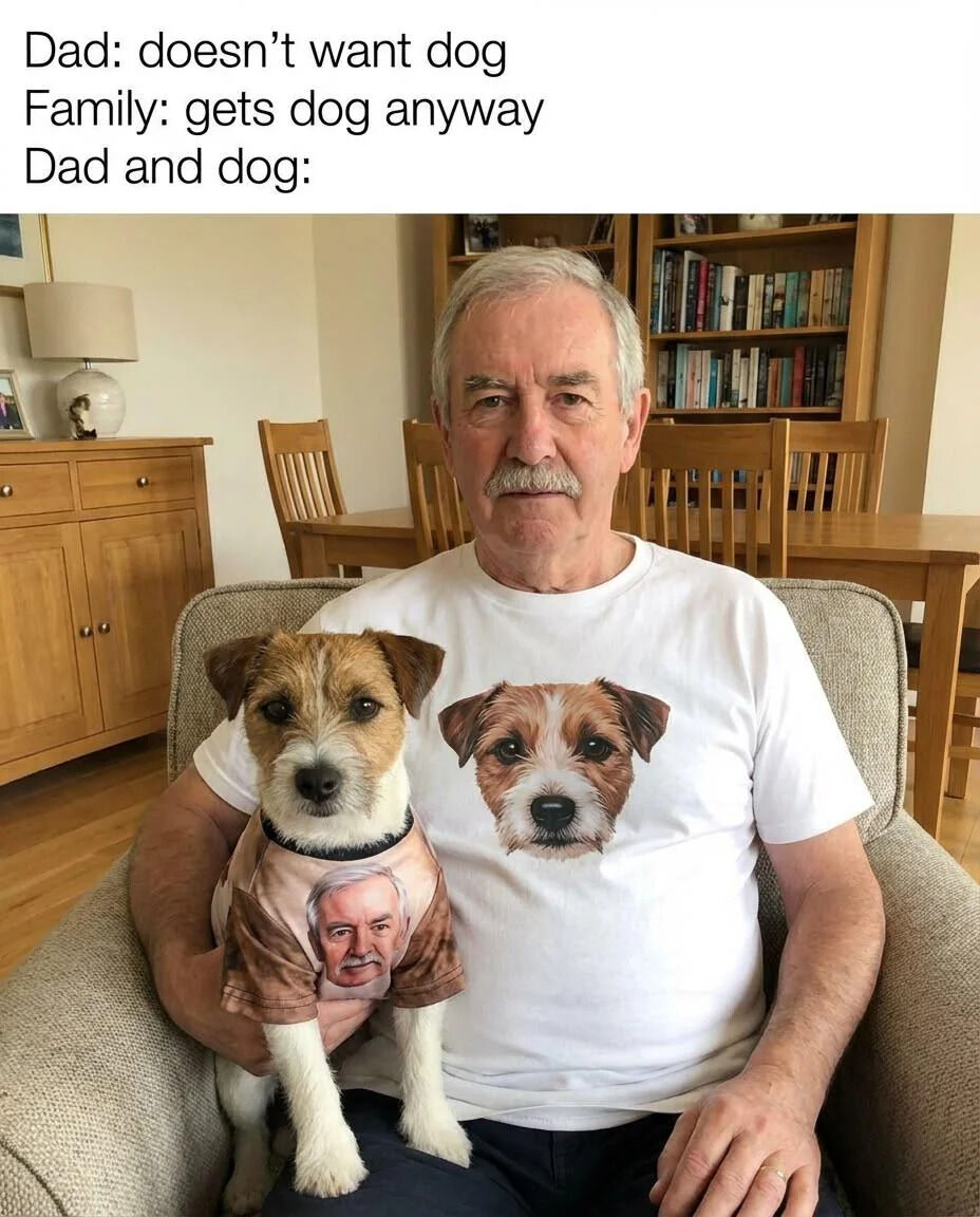 This wholesome meme follows a widely relatable trope of a parent initially resisting getting a family pet, then growing deeply attached to it. The text at the top sets up the scenario: the father states he does not want a dog, the family gets the dog regardless, and the punchline photograph shows the father and the Jack Russell Terrier dog sitting together on an armchair wearing matching custom shirts: the father's t-shirt has a print of the dog's face, while the dog's shirt has a print of the father's face, clearly demonstrating how much the father has grown to love the dog he initially didn't want. The background shows a cozy home space with wooden dining furniture, a sideboard, and bookshelves.