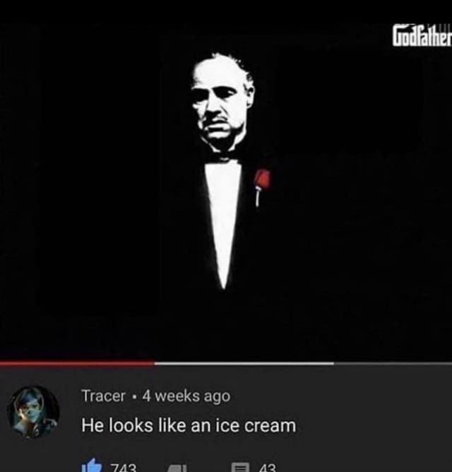 The image is divided into two sections. The upper section features a black and white still from 'The Godfather' depicting a man in a formal tuxedo with a white shirt, black bow tie, and a red rose pinned to his lapel, with the word 'Godfather' visible in the top right corner. The lower section shows a social media comment interface where a user named 'Tracer' posted a comment 4 weeks ago stating 'He looks like an ice cream,' accompanied by 743 likes and 43 replies. The humor stems from the playful visual comparison between the character's white shirt (resembling ice cream) and the black tuxedo (resembling a cone).