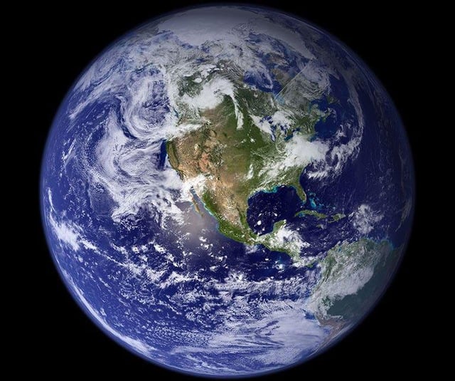 This is an ironic meme that uses the famous public-domain NASA 'Blue Marble' photograph of planet Earth, centered against a solid black outer space background, showing North and Central America on the planet's surface. The post title is 'Most overrated planet', with the image being Earth itself. The humor comes from the absurd, ironic take: while Earth is the only known habitable planet for humanity, many people joke about it being 'overrated' due to all its problems like climate change, political conflict, and everyday inconveniences.