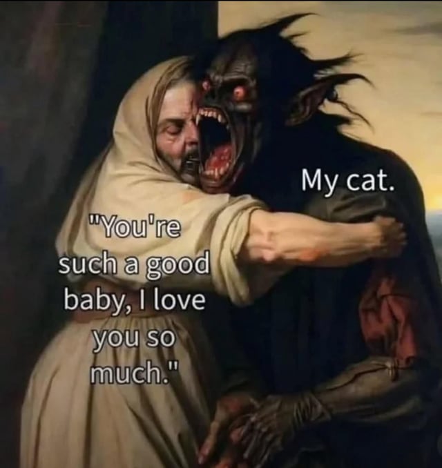 A meme featuring a classical-style painting of a robed person embracing a terrifying, demonic monster with sharp teeth, red eyes, and a menacing open mouth. The person is depicted saying, 'You're such a good baby, I love you so much,' while the monster is labeled 'My cat.' The humor stems from the ironic contrast between the person's affectionate, wholesome words and the monster's fearsome appearance, playfully exaggerating the dynamic of loving a pet despite its sometimes intimidating or unruly behavior, a common relatable experience for cat owners.