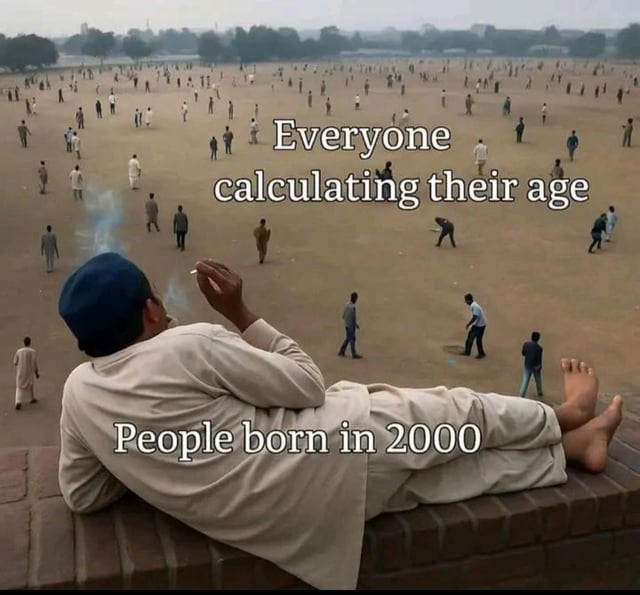 This meme uses a forced perspective photograph to deliver relatable humor about age calculation. In the foreground, a relaxed man lies on a brick ledge, smoking a cigarette and appearing completely unbothered, with the text 'People born in 2000' below him. The background features a large open field filled with dozens of small-looking individuals, each seemingly pacing or focused on figuring something out, paired with the top text 'Everyone calculating their age'. The joke hinges on the contrast: many people (especially those born before 2000) overcomplicate or struggle with quick mental math to determine their current age, while those born in 2000 often feel amused or detached from this minor, everyday struggle. The forced perspective makes the background crowd look tiny, emphasizing the scale of the 'chaos' of age calculation compared to the laid-back observer.