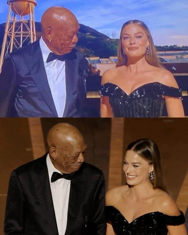 A two-panel meme collage featuring Morgan Freeman and an unidentified woman in formal evening wear. The top panel shows them standing outdoors with a water tower and hills in the background; Morgan Freeman, dressed in a dark blue tuxedo, looks downward with a neutral, disinterested expression while the woman, in a black off-the-shoulder sequined gown, smiles and faces him. The bottom panel depicts the same pair in an indoor setting with warm lighting, where Morgan Freeman (now in a black tuxedo) maintains his indifferent demeanor, looking slightly to his side, while the woman continues to smile and engage with him. The contrast in their expressions humorously suggests Morgan Freeman's apparent lack of interest.