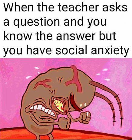 The image consists of a top text overlay and a cartoon character. The text reads: 'When the teacher asks a question and you know the answer but you have social anxiety.' Below the text is a brown, anthropomorphic cartoon character with a distressed appearance: it has a single prominent yellow-and-red eye, furrowed brows, bared teeth, and is clenching its fists tightly. The background is a soft pink gradient, enhancing the emotional intensity of the scene. The character's posture and expression vividly convey the tension and internal struggle of someone with social anxiety who wants to respond but feels unable to.