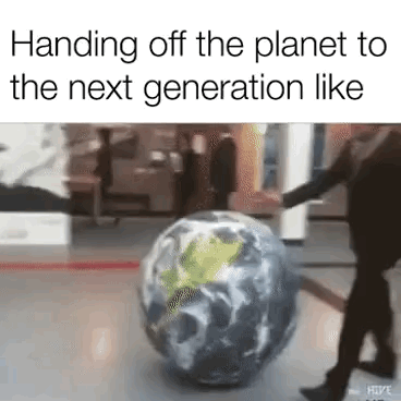 This meme has text at the top that reads 'Handing off the planet to the next generation like', displayed above a blurry still of a man in a suit kicking a heavily worn, damaged model of the Earth across an indoor floor. The joke uses dark sarcasm to critique the careless way older generations are passing down a degraded, damaged planet to younger generations, making no meaningful effort to repair it before handoff.