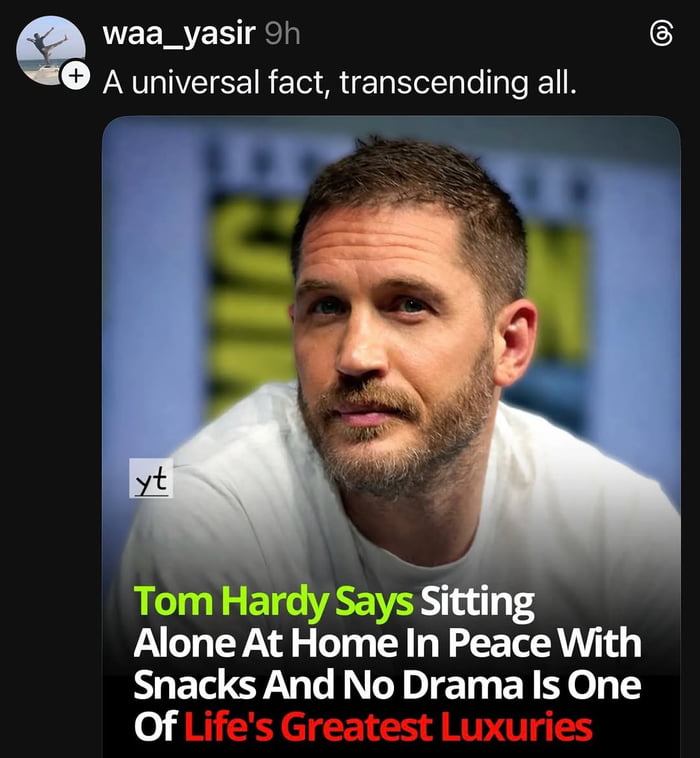 This image is a screenshot of a social media post (likely from Instagram) by user 'waa_yasir', posted 9 hours prior to the screenshot being taken. The post's top caption reads 'A universal fact, transcending all.' Below this caption is a photograph of actor Tom Hardy, taken at what appears to be San Diego Comic Con (evidenced by the blurred Comic Con logo in the background). Overlaid on the photograph is text attributing a quote to Tom Hardy: 'Tom Hardy Says Sitting Alone At Home In Peace With Snacks And No Drama Is One Of Life's Greatest Luxuries'. A small 'yt' watermark is visible on the left side of Tom Hardy's white shirt. The content resonates with audiences by highlighting the appeal of quiet, low-stakes, drama-free moments as a valuable luxury, a sentiment many people find relatable in busy, chaotic lives.