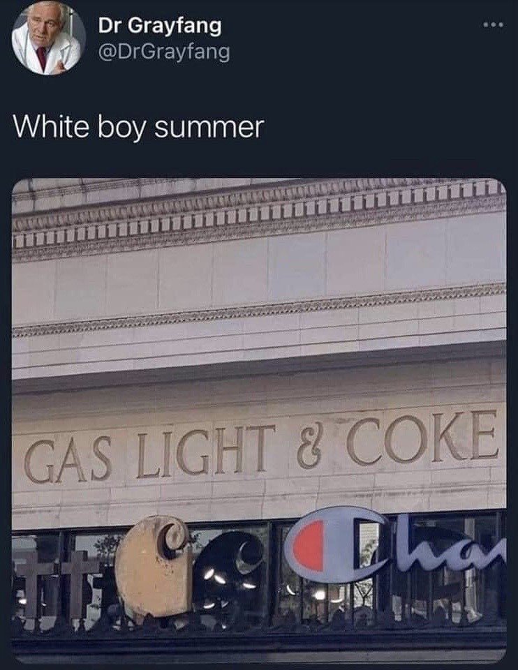 This is a screenshot of an X (formerly Twitter) post. The top of the screenshot shows the poster's profile: a male doctor avatar, display name Dr Grayfang, handle @DrGrayfang. The post text reads 'White boy summer'. Below the text is a photograph of a stone building facade engraved with the phrase 'GAS LIGHT & COKE', with a partial view of the Champion clothing brand logo visible in the window below the engraving. The meme relies on wordplay: it references the popular internet phrase trifecta 'gaslight, gatekeep, girlboss' swapping the latter two terms for 'coke' (slang for cocaine) paired with the 'white boy summer' slang term, satirizing stereotypes of reckless, manipulative behavior associated with the 'white boy summer' concept.