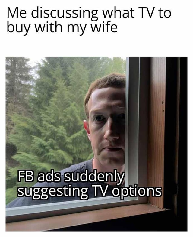 A meme featuring two text overlays and a photograph. The top text reads 'Me discussing what TV to buy with my wife,' and the bottom text states 'FB ads suddenly suggesting TV options.' The accompanying image shows a person intensely peering through a window, with a backdrop of lush green trees. The combination humorously captures the relatable experience of targeted advertising (specifically Facebook ads) feeling intrusive, as if eavesdropping on personal conversations about purchasing a TV.