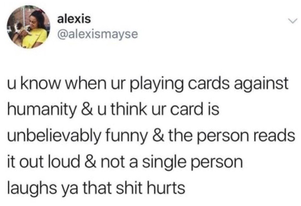 This is a screenshot of a public X (formerly Twitter) post. The text describes a highly relatable awkward social scenario: when playing the adult party game Cards Against Humanity, you select a response card you believe is extremely funny, but when the round judge reads your card out loud to the group, no one laughs, leaving you embarrassed and upset. The top left of the screenshot shows the poster's profile picture, a photo of a woman in a yellow shirt holding a small dog, alongside her display name and username.