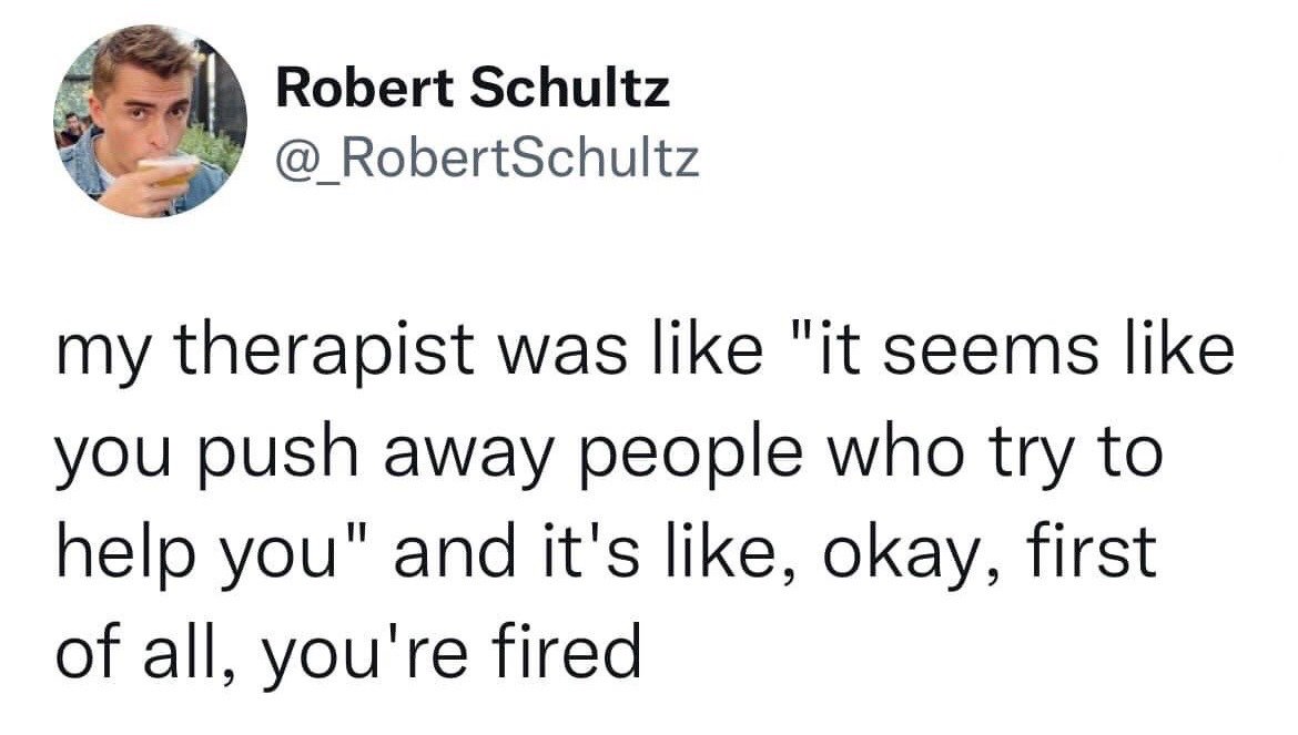 This is a screenshot of a public post from X (formerly Twitter) user Robert Schultz. The post is a humorous, self-deprecating joke: the poster recounts their therapist pointing out that they push away people who try to help them, and the poster immediately responds by firing the therapist, which serves as an ironic punchline that inadvertently proves the therapist's assessment correct. The top left of the image shows the user's profile photo of a young man drinking a beverage, alongside his display name and X handle.