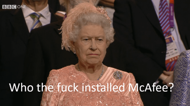 This meme features a still shot of Queen Elizabeth II from a BBC One broadcast, displaying a distinctly unimpressed, annoyed facial expression. White text overlaid at the bottom of the image reads "Who the fuck installed McAfee?". The joke draws on widespread common frustration among computer users: McAfee antivirus software is often pre-installed as bloatware on new Windows devices, and frequently generates intrusive, unwanted pop-up notifications that are annoying to disable or remove, perfectly matching the queen's irritated demeanor.