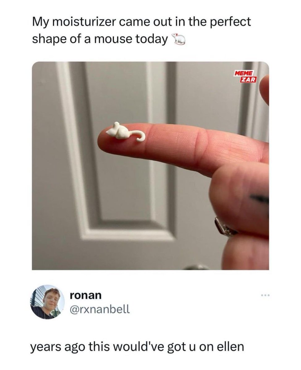 The meme combines an original social media post and a viral reply comment. The top section has text stating 'My moisturizer came out in the perfect shape of a mouse today' paired with a mouse emoji, above a photo of a person's outstretched index finger holding a small blob of white moisturizer that coincidentally looks exactly like a tiny mouse, with raised ears and a curved tail, set against a background of an interior white door. A 'MEME ZAR' watermark appears on the top right of the photo. Below the photo is a reply from X/Twitter user @rxnanbell that reads 'years ago this would've got u on ellen', a humorous nostalgic reference to the peak popularity of *The Ellen DeGeneres Show*, when small quirky viral moments like this were frequently featured as guest segments on the daytime talk show.