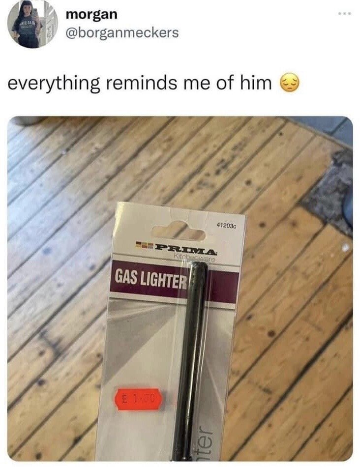 This is a screenshot of a public X (formerly Twitter) post from user Morgan (@borganmeckers). The tweet's caption reads 'everything reminds me of him' followed by a sad face emoji, above a photo of a still-packaged Prima kitchen gas lighter. The core joke is a homophonic pun: the product name 'gas lighter' is pronounced exactly the same as 'gaslighter', a common slang term for a person who manipulates others into doubting their own perception, memory, or sanity. The poster is humorously implying that the generic kitchen tool reminds them of a former partner or person who previously gaslit them.