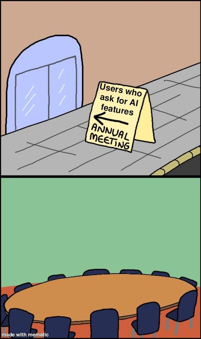 A two-panel comic meme. The top panel depicts a hallway with a blue double door and a yellow sign that reads 'Users who ask for AI features → ANNUAL MEETING' with an arrow pointing left towards the door. The bottom panel shows an empty meeting room with a large round wooden table surrounded by blue chairs, emphasizing that no one attends the annual meeting for users who ask for AI features. The humor lies in the implication that such users are so few they don't fill the meeting room.
