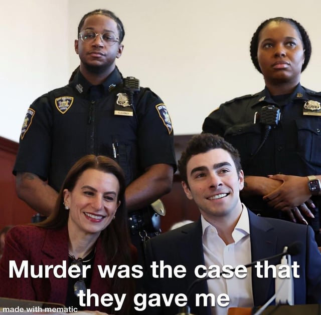 A courtroom scene featuring two NYPD police officers in dark uniforms with visible badges standing behind a seated man and woman. The man wears a dark suit with a white shirt, and the woman is dressed in a red blazer; both are smiling. The police officers have neutral expressions, with one standing with arms crossed and the other with hands at their sides. A prominent text overlay at the bottom reads 'Murder was the case that they gave me', and a 'made with mematic' watermark is present in the bottom left corner. The contrast between the cheerful demeanor of the seated individuals and the serious text creates an ironic tone.