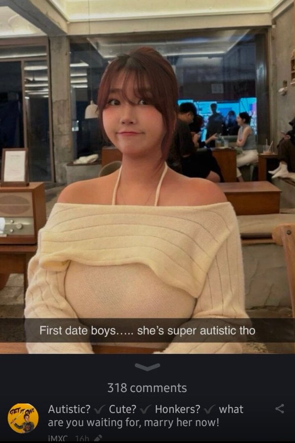 A photograph of a woman sitting in a casual café setting, wearing an off-shoulder cream-colored sweater. The background shows other patrons seated at tables, with a warm, ambient atmosphere. Overlaid text at the bottom of the image reads: 'First date boys..... she's super autistic tho'. Below the image, a comment section is visible, displaying '318 comments' and a top comment from user 'GETT ONE' that states: 'Autistic? ✓ Cute? ✓ Honkers? ✓ what are you waiting for, marry her now!'. The comment uses checkmarks to emphasize traits and slang ('honkers' referring to breasts) for comedic effect.