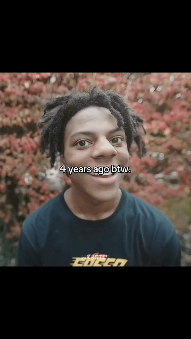 This is a throwback meme showing an old photo of popular American streamer IShowSpeed (Darren Watkins Jr.) when he was much younger. In the photo, he is outdoors in front of red autumn foliage, smiling directly at the camera with his early dreadlocks hairstyle. The overlaid text on the image notes that this photo was taken 4 years prior to when the meme was posted.