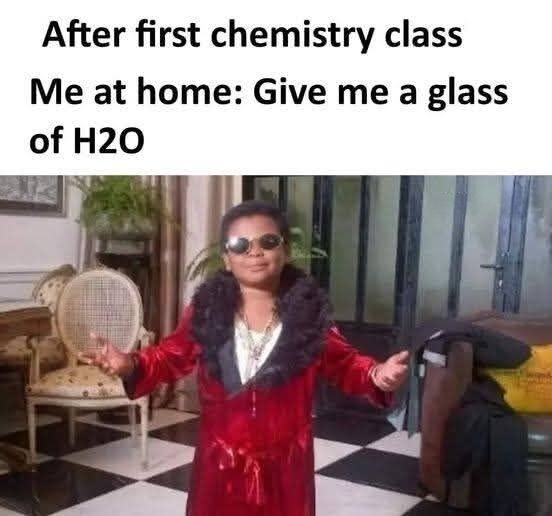 The meme features text at the top reading 'After first chemistry class Me at home: Give me a glass of H2O', paired with an image of a young boy in a fancy red velvet robe with black fur trim, sunglasses, and gold necklaces posing with outstretched arms in a smug, overly pompous gesture indoors. The joke relies on relatable student humor: someone who just learned very basic chemistry immediately tries to show off their new knowledge by unnecessarily referring to water by its chemical formula H2O to sound more sophisticated than they are.
