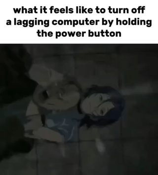 This meme is composed of text at the top and a visual below. The top text reads 'what it feels like to turn off a lagging computer by holding the power button'. Below the text is a dark, low-resolution clip of two anime-style characters: one character is cradling a second limp, unresponsive character in their arms in a dramatic, distressed pose. The visual acts as an exaggerated, humorous metaphor for the experience of force shutting down a frozen, lagging computer, framing the mundane action as a dramatic act of putting the malfunctioning device out of its misery, which is relatable to anyone who has dealt with an unresponsive PC.