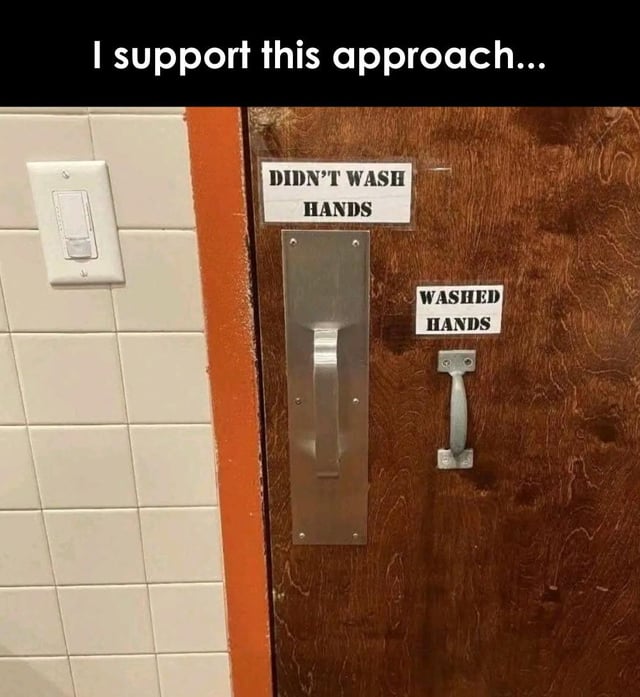 This meme displays a public restroom exit door fitted with two distinct door handles. The larger, main door handle is positioned below a label that reads 'DIDN'T WASH HANDS' for use by people who did not wash their hands after using the restroom, while a smaller separate handle to its right is labeled 'WASHED HANDS' for people who did wash their hands, to avoid cross-contamination from unwashed hands. Text at the top of the meme reads 'I support this approach...', expressing approval of this clever, hygiene-focused solution. A white tiled restroom wall and light switch are visible to the left of the door.