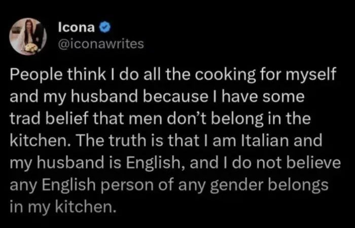 A screenshot of a Twitter/X post by user Icona (@iconawrites) featuring a humorous and sarcastic tweet. The tweet addresses the misconception that the author does all the cooking due to traditional gender beliefs, clarifying instead that her English husband (and any English person) is excluded from the kitchen, playing on lighthearted cultural stereotypes about English cooking.