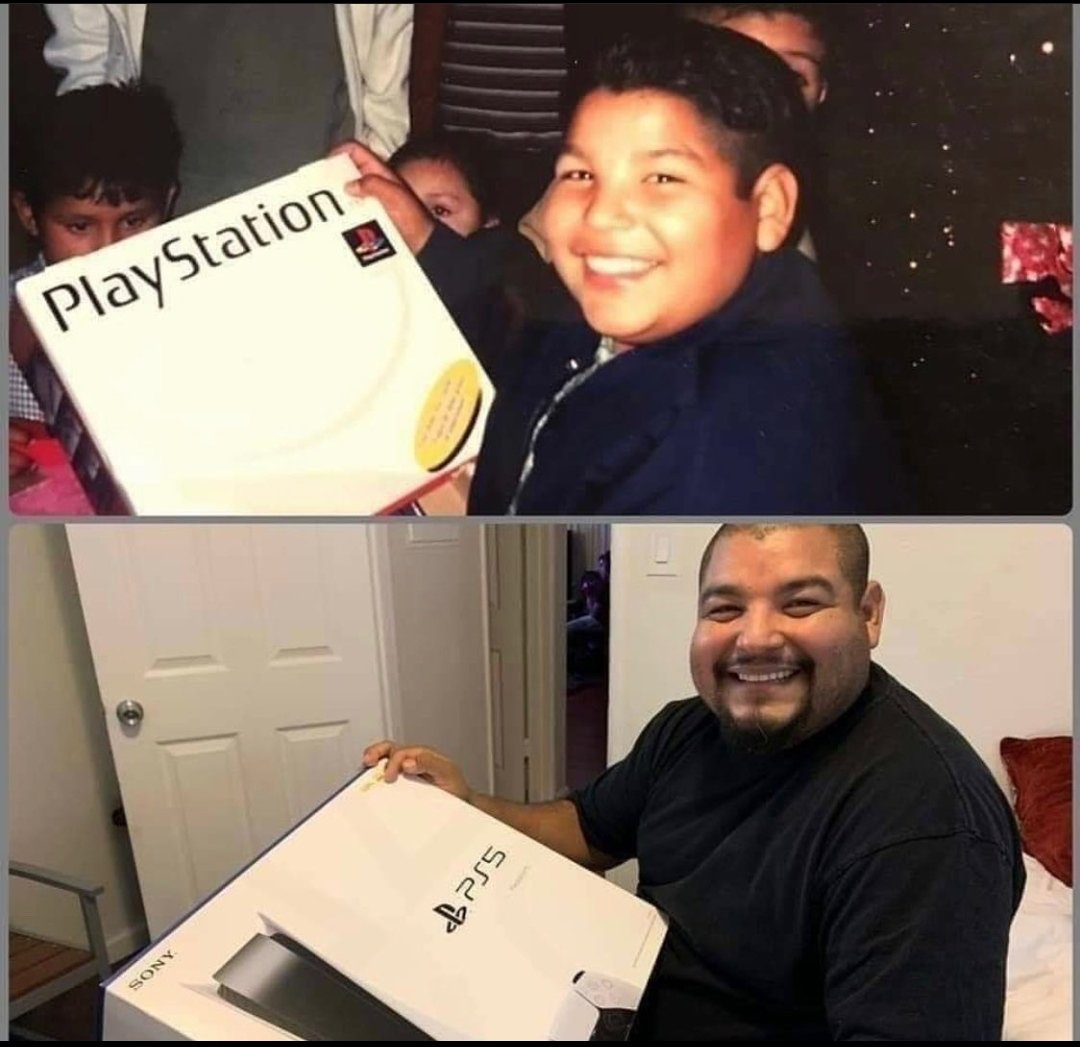 This is a two-panel vertical collage meme. The top panel features a young boy smiling widely and excitedly holding up an original PlayStation console box, with other children visible in the background of what appears to be a birthday or gift-giving event. The bottom panel shows the same person as an adult man with a shaved head and beard, holding a PlayStation 5 (PS5) console box, recreating the exact same happy pose from his childhood photo. The meme highlights the long-lasting joy of gaming and the nostalgic, wholesome feeling of keeping the same hobby across decades of life.