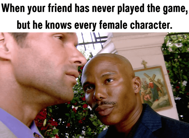 A meme consisting of a live-action screenshot of two men in a tense confrontation, with bold text at the top reading 'When your friend has never played the game, but he knows every female character.' The men are positioned closely, facing each other, with one appearing intense and the other looking skeptical. The background includes floral decorations and a religious painting with a cross, adding to the dramatic tone. The humor stems from the irony of someone being unfamiliar with a game yet having detailed knowledge of its female characters, amplified by the serious expressions of the men.