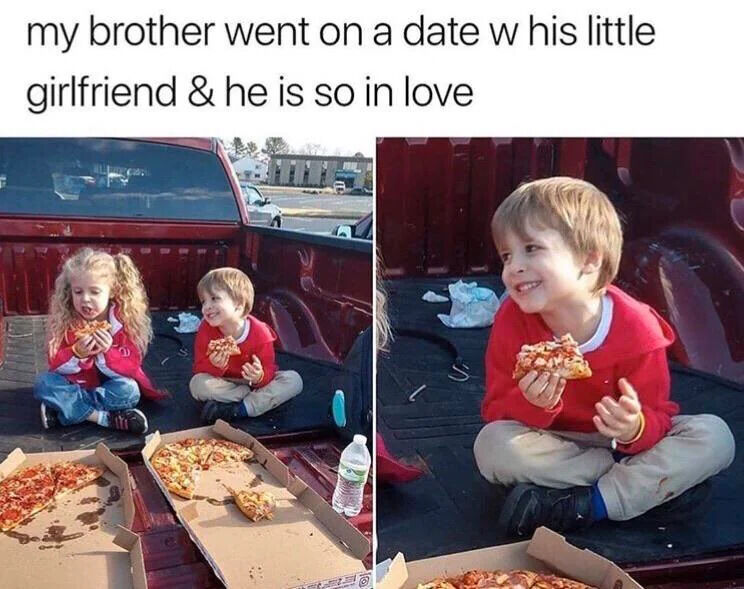 This is a two-panel wholesome meme. The text at the top of the image reads 'my brother went on a date w his little girlfriend & he is so in love'. The left panel shows two small children, a blonde girl in pigtails and a young blonde boy both dressed in red tops, sitting cross-legged in the open bed of a red pickup truck, sharing takeout pizza from two open pizza boxes placed in front of them, with a bottle of water next to the boxes. The boy is looking at the girl with a wide, happy smile. The right panel is a close-up shot of the young boy, holding a slice of pizza and grinning adoringly off-camera at the girl, clearly overjoyed to be spending time with her, capturing a sweet, innocent moment of childhood puppy love.