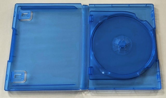 This meme displays an open, completely empty standard blue PlayStation Blu-ray game case, with no game disc, cover art, or instruction manual inside. The humor comes from the attached title, which claims the empty case is a secured copy of the unreleased video game Grand Theft Auto VI (GTA 6), poking fun at the extremely long wait for the highly anticipated title, as well as the widespread hype surrounding its eventual launch.