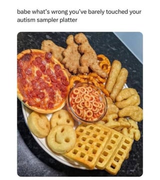 The meme displays a large round platter arranged with a variety of popular processed, savory 'safe foods' commonly enjoyed by many autistic people: a small personal pepperoni pizza, dinosaur-shaped breaded chicken nuggets, curly fries, mozzarella sticks, tater tots, smiley face potato fritters, waffle fries, and a central bowl of SpaghettiOs ring pasta in tomato sauce. The text printed above the platter reads 'babe what's wrong you've barely touched your autism sampler platter'. The joke is an affectionate, relatable reference to the common neurodivergent experience of having restricted food preferences, leaning towards familiar, consistent-texture, child-friendly comfort foods, framed humorously as a curated sampler meal.