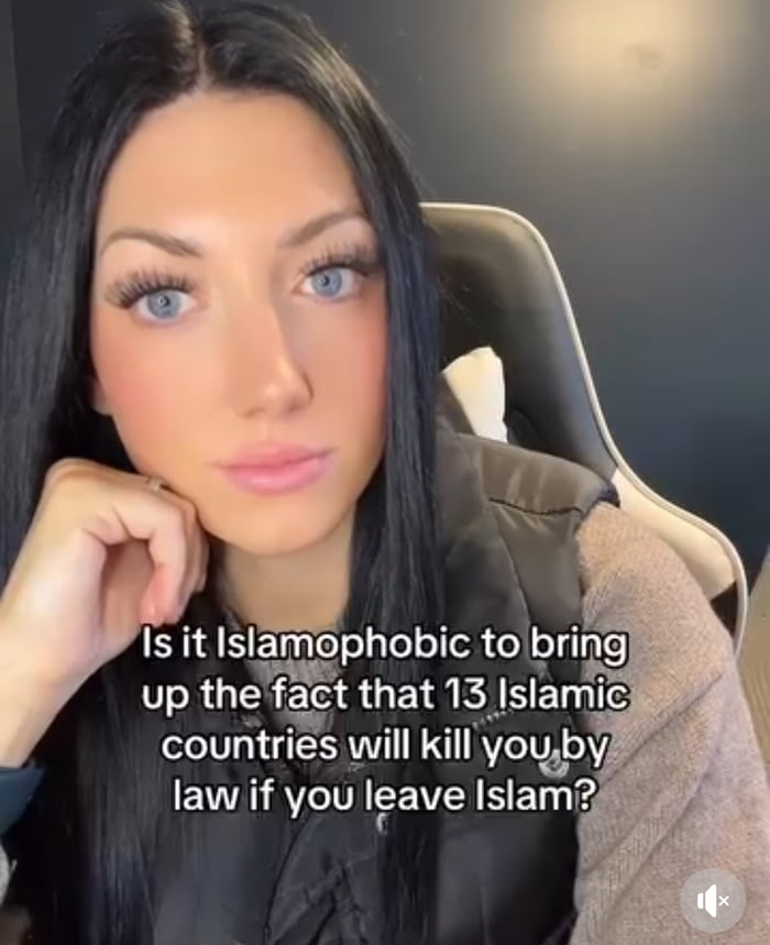 An image showing a woman with long black hair sitting in a chair, resting her hand on her face. Overlaid text poses a question about whether it's Islamophobic to mention that 13 Islamic countries have laws that can result in the death penalty for leaving Islam. The woman appears to be the subject of the image with the controversial question overlaid on top of her image. There is a muted video icon in the bottom right corner, indicating this is likely a screenshot from a video.