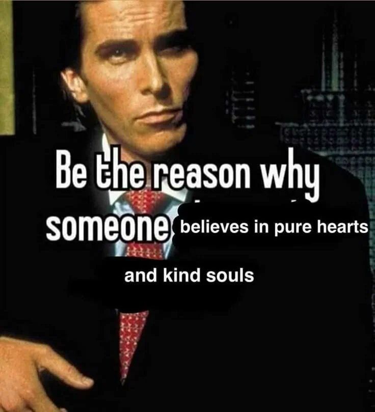An image featuring a person wearing a black suit, white shirt, and red patterned tie, with a serious expression. The background is dark, suggesting an indoor, possibly formal setting. Overlaid in white text is the motivational message: 'Be the reason why someone believes in pure hearts and kind souls'. The tone is uplifting and wholesome, encouraging acts of kindness.