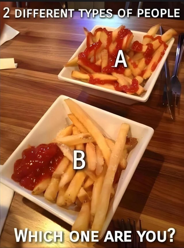 The image displays two servings of French fries in white square bowls set on a wooden restaurant table. The text at the top reads '2 DIFFERENT TYPES OF PEOPLE'. The first serving, labeled A, has ketchup drizzled liberally all over the top of the fries. The second serving, labeled B, has a single separate pile of ketchup placed in one corner of the bowl, with the rest of the fries plain, intended for dipping. The text at the bottom asks 'WHICH ONE ARE YOU?', prompting viewers to state their preferred method of eating fries with ketchup. It is a relatable, lighthearted meme that categorizes people based on small, common daily food preferences.