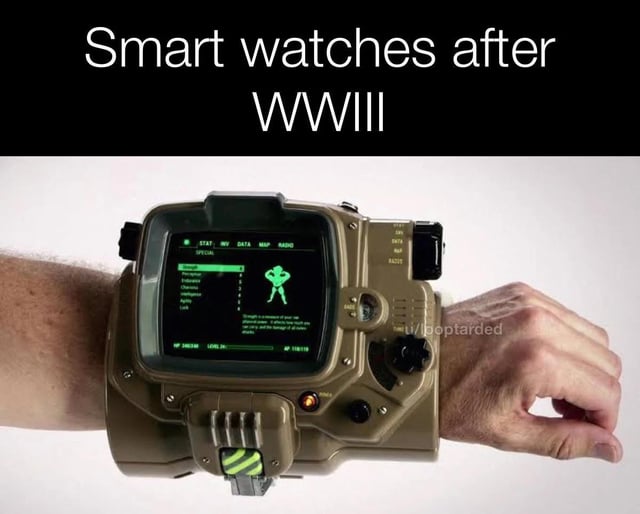 The meme presents a satirical vision of post-WWIII smartwatches, featuring a close-up of a person's arm wearing an extremely bulky, military-inspired wrist device. The watch has a rugged, utilitarian design with a green digital display showing various metrics and a simple stick figure icon, contrasting sharply with modern sleek smartwatch aesthetics. The top text 'Smart watches after WWIII' humorously suggests that future technology might regress to oversized, functional designs in a post-apocalyptic context.