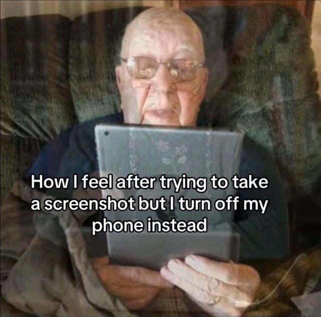 This relatable meme features an elderly man with glasses sitting in a comfortable armchair, holding a tablet. The semi-transparent reflection of the tablet screen over his face makes him look dazed, disoriented, and blank, perfectly matching the described feeling. The overlaid text jokes about the common relatable smartphone user mishap of trying to take a screenshot, fumbling the button combination, and accidentally turning off the device instead. The original poster also alludes to the similar common mishap of accidentally turning the volume all the way up instead of taking a screenshot.