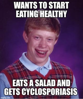This is a classic Bad Luck Brian advice animal meme. The top overlaid text reads "WANTS TO START EATING HEALTHY", and the bottom overlaid text reads "EATS A SALAD AND GETS CYCLOSPORIASIS". The joke relies on ironic misfortune: the subject tries to improve their health by eating a salad, a widely considered healthy food, but instead contracts cyclosporiasis, a parasitic foodborne illness commonly linked to contaminated fresh produce like salad greens, which is the exact opposite of the intended positive outcome, playing directly into the Bad Luck Brian character's signature trope of experiencing absurdly unlucky events. The subject wears a light blue collared shirt under a red plaid sweater vest against a solid purple background, with his signature awkward, teary smiling expression and braces.